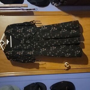Lauren Conrad size small dress with ties on the breast area and sleeves